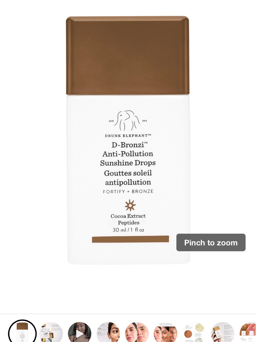 Drunk Elephant Glow-Boosting Sheer Fluid in Gold and White